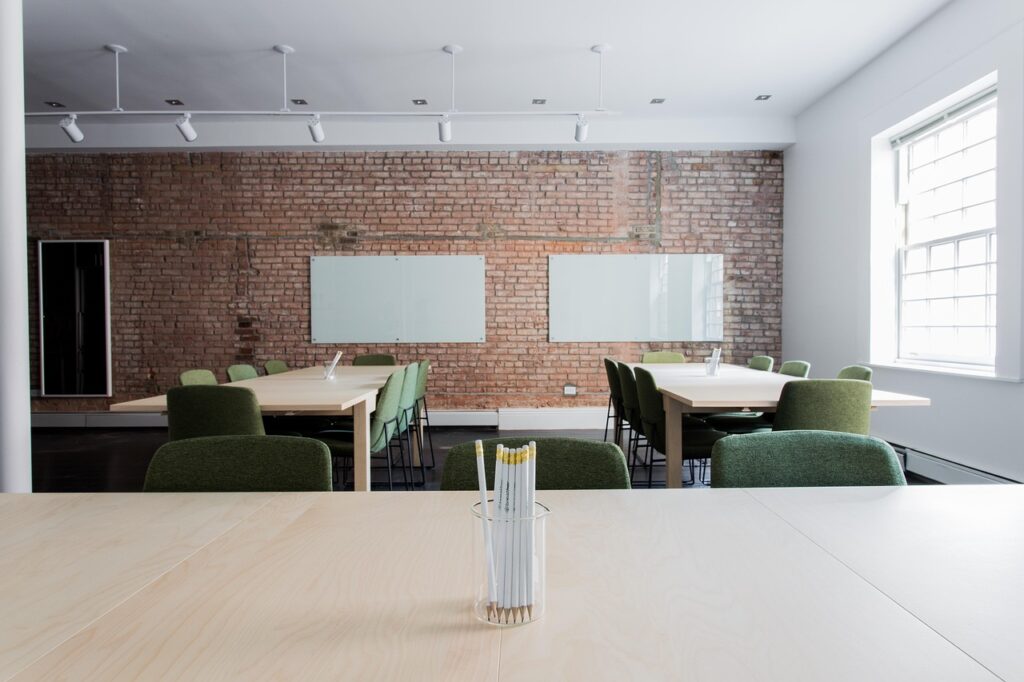 Photograph showing a meeting room with tables and chairs